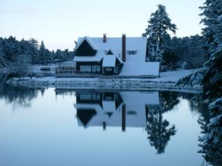 ake home in the snow on the water