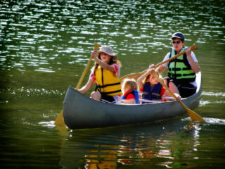 family on a canoe