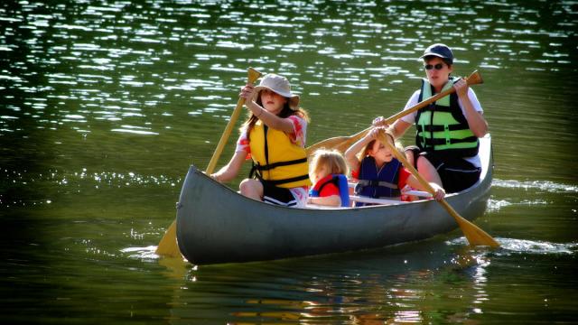 family on a canoe