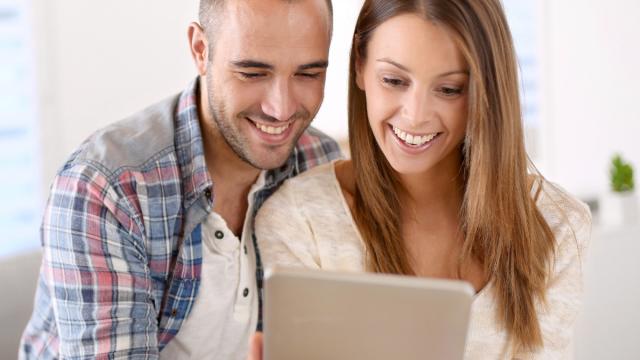 couple reading a magazine