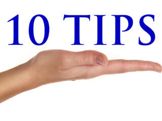 hand holding the words "10 tips"