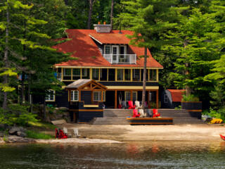 water front lake house in wooded area