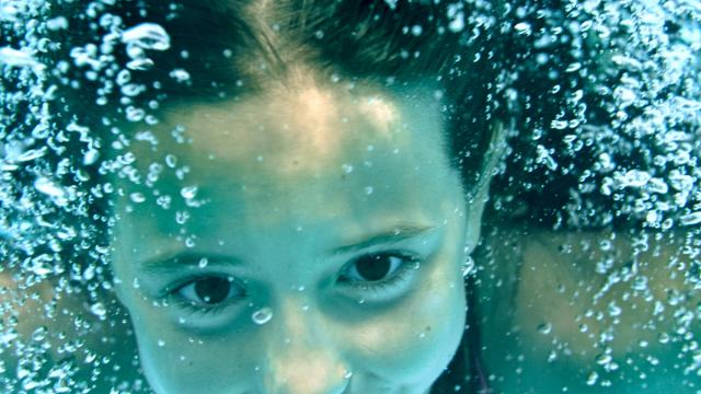 child in a swimming pool