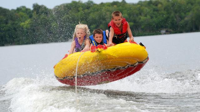 Kids tubing at the lake