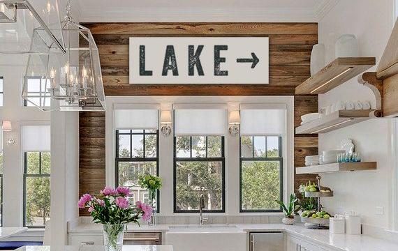 white and wood kitchen with lake sign