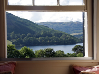 looking out at the lake through window