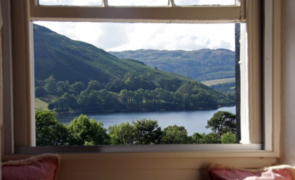 looking out at the lake through window