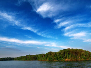 Tree line and open sky over Smith Mountain Lake