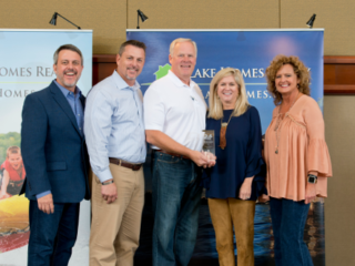 Lake Homes Realty CEO, COO and Splash Award winners