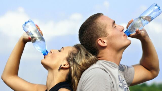 Couple Drinking Water