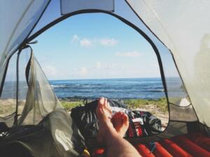 tent on the lake's shore