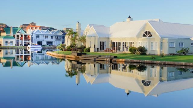 white house overlooking the lake