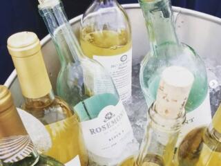 A bucket of white wine bottles from the Rosemont of Virginia Winery