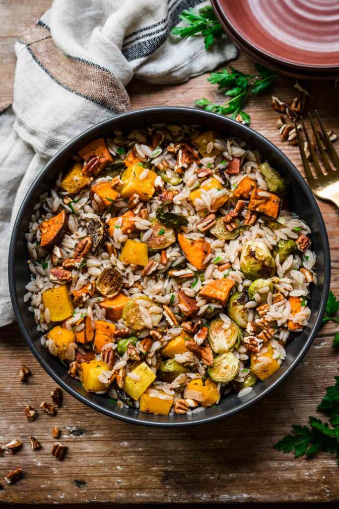 Mix of harvest orzo, brussels sprouts, butternut squash, and pecans. 