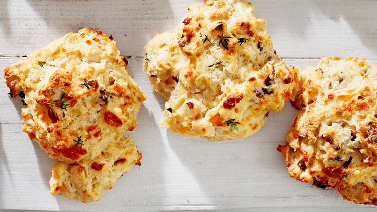 Buttermilk Breakfast-Sausage-and-Gruyère Drop Biscuits seasoned with fresh thyme and red pepper flakes.