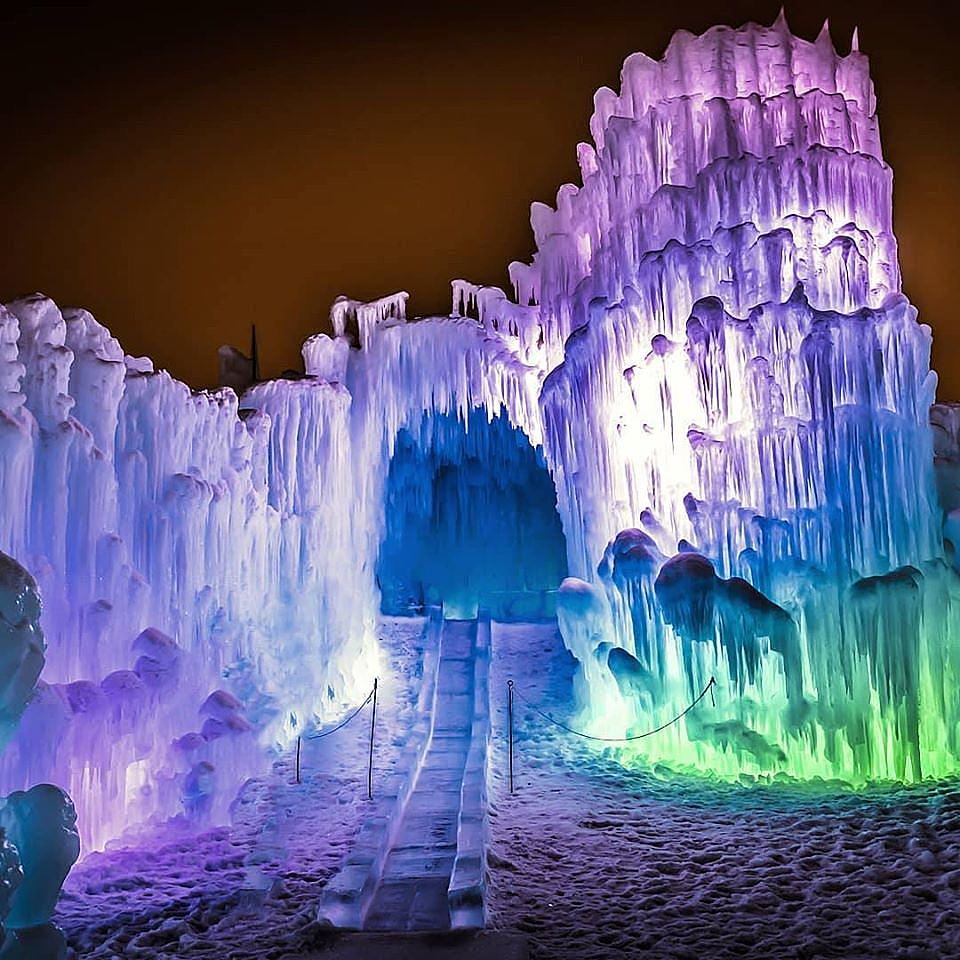 Colorful frozen winter attraction at night. 