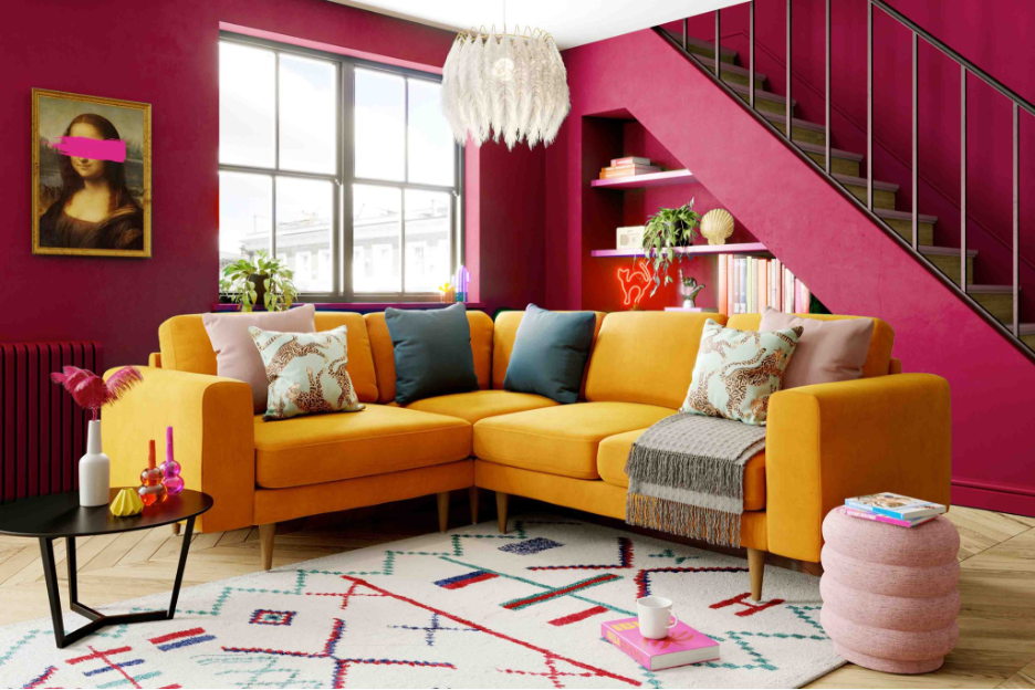 Reading nook wall under a staircase with  Pantone Color of the Year 2022,  18-1750 Viva Magenta and turmeric sofa from Snug