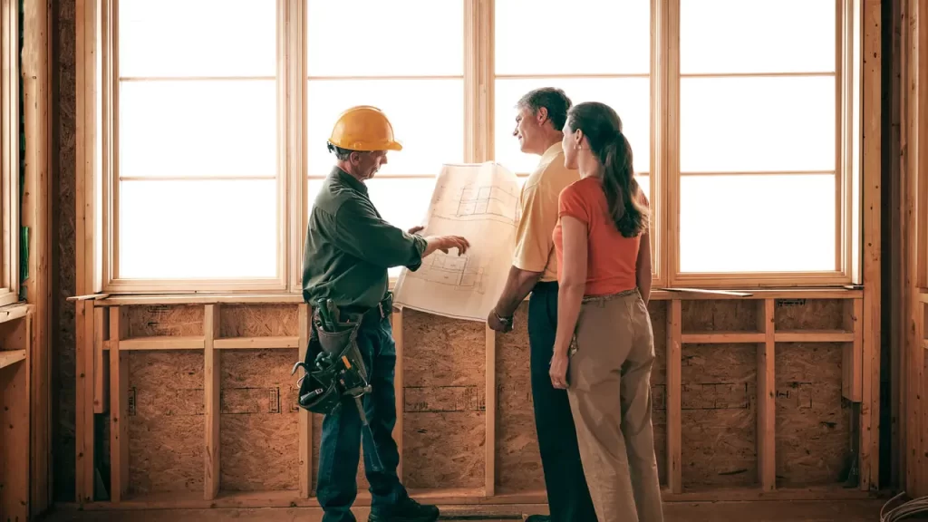 Contractor showing plans to couple