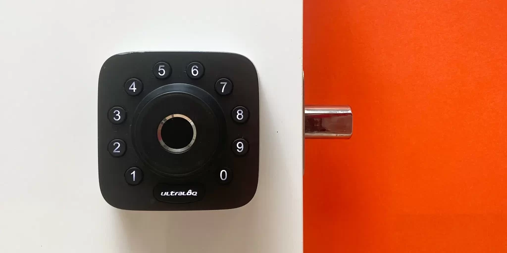 integrated smart lock in black with white numbers