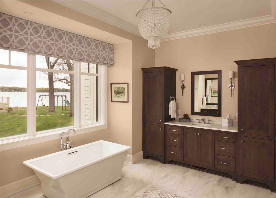 primary bath with soaking tub looking onto Lake Nagawicka at lake home