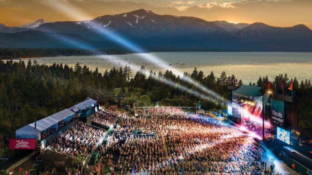 crowds at a festival in front of lake tahoe