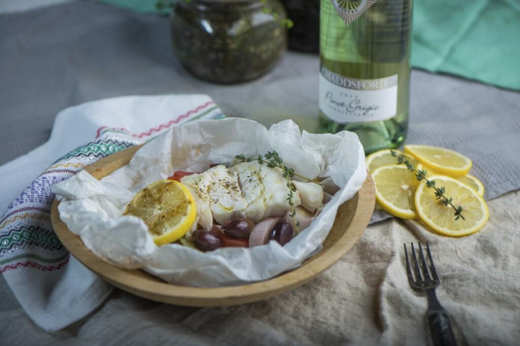 Cod baked in parchment paper served with Pinot Grigio