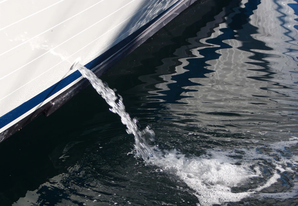 water coming out of a boat