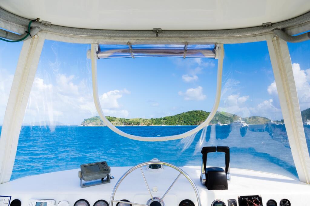view from the cabin of a boat with a clean window and the ocean