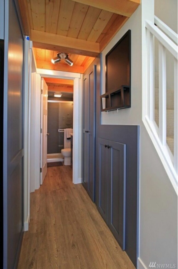 hallway storage spaces in tiny lake home