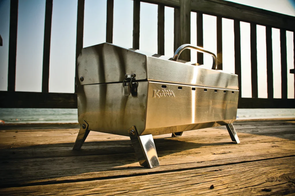 Closed Kuuma Stow N’ Go 160 Stainless-Steel Portable Charcoal Grill from Camco Marine