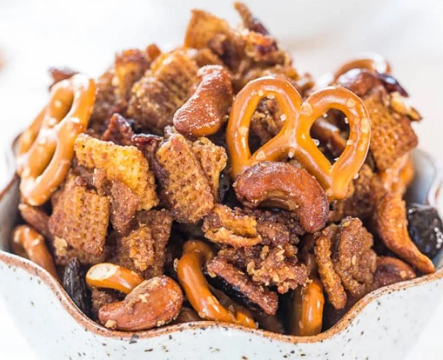 Chex mix made with nuts, fruits, pretzels, and maple