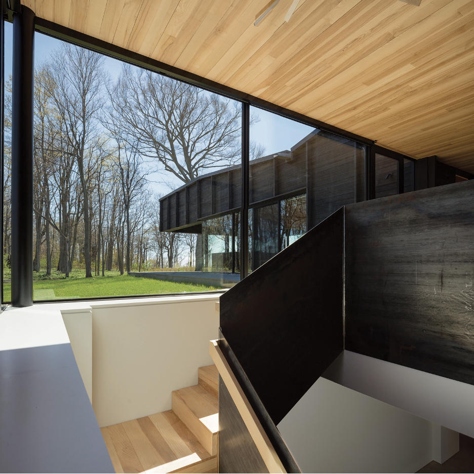 Interior stairway showing mix of beautiful natural woods