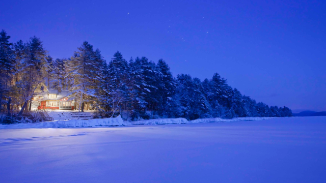 Lake home in the snow on Lake Winnipesaukee, New Hampshire.