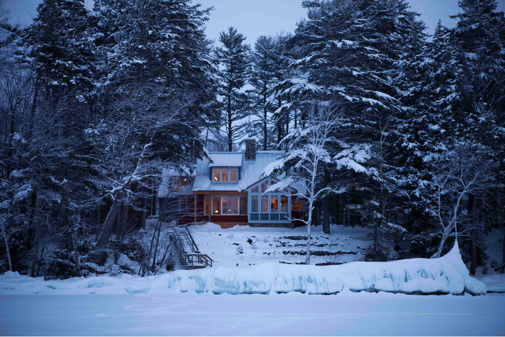 Exterior shot from the shoreline of a snow-covered landscape at Lake Winnipesaukee