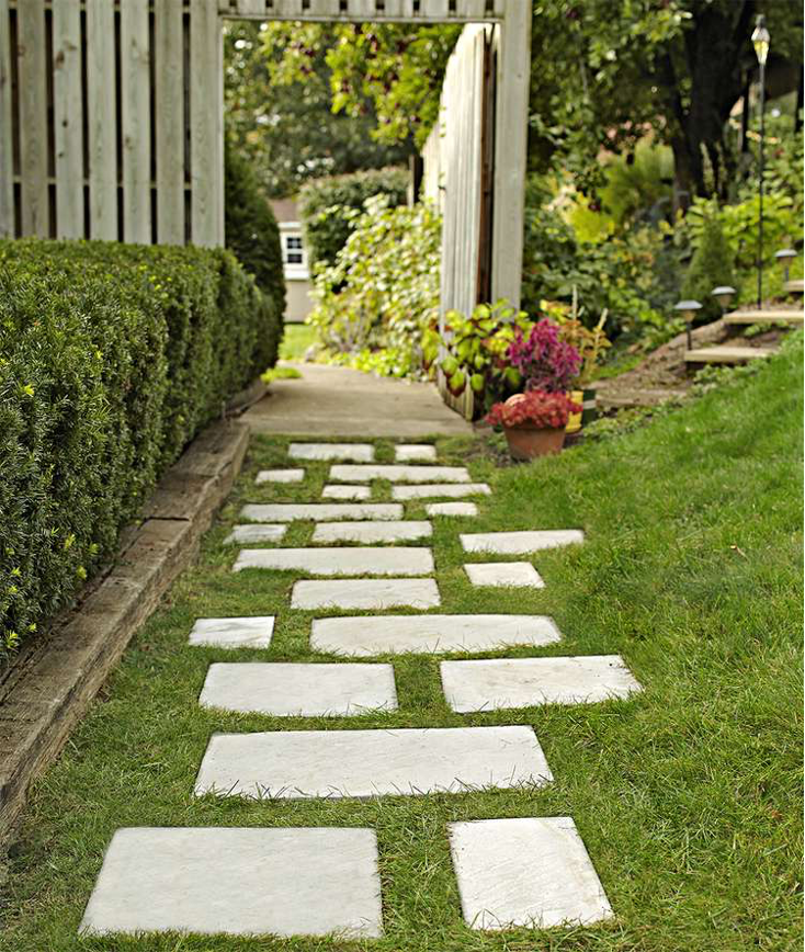 white stone pavers over green grass