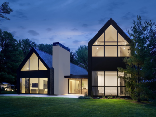 Designed by Milwaukee-based architect Stephen Bruns, founder of Bruns Architecture, grassy swath of lakefront property in Pukwana Beach, Wisconsin, on the shores of Lake Winnebago.