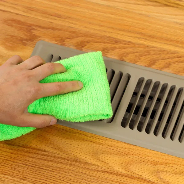 cleaning dust from an Air Vents 
