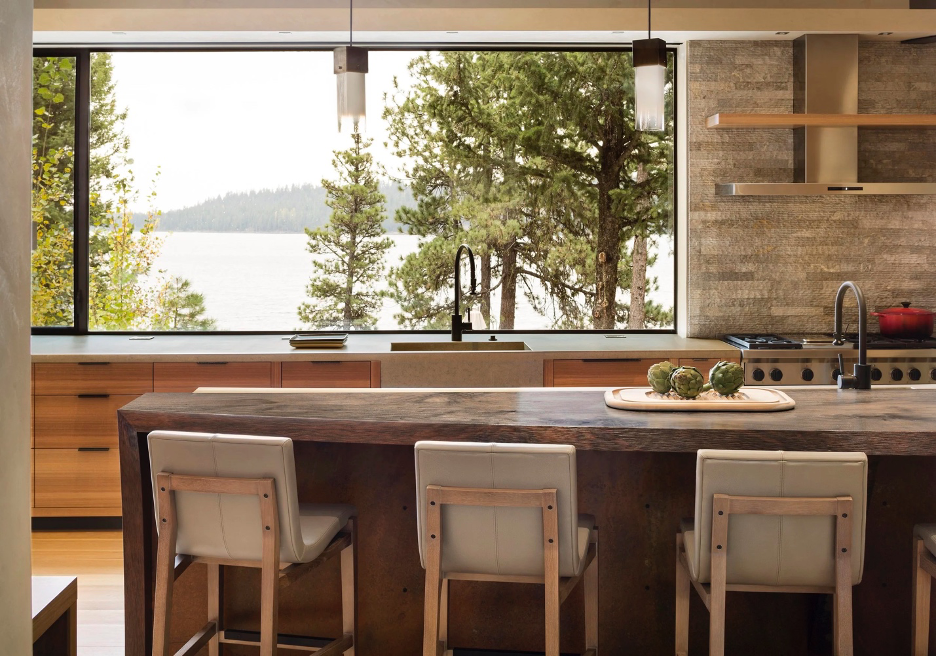Beautiful modern kitchen in a lake home with a beautiful lake view above the kitchen sink