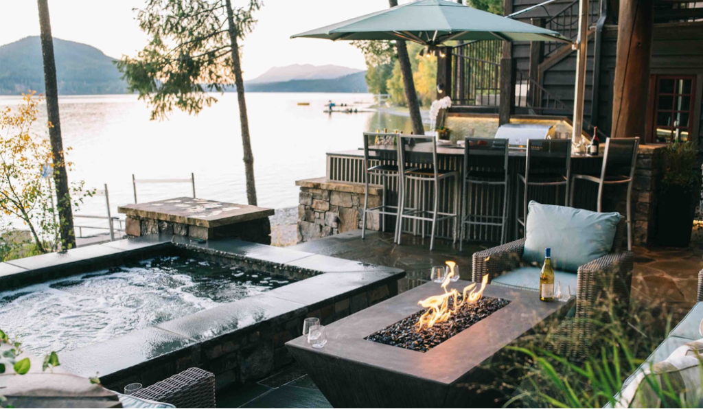 Luxurious outdoor living space at a lake home on Whitefish Lake, Montana, by White Cloud Design.