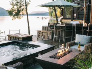 Luxurious outdoor living space at a lake home on Whitefish Lake, Montana, by White Cloud Design.